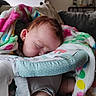 baby, infant, sleeping, nap, face, portrait, blanket, colorful_blanket, baby_seat, cushion, home, indoors, cozy, brown_hair, closed_eyes, resting, nursery, furniture, soft_texture, child