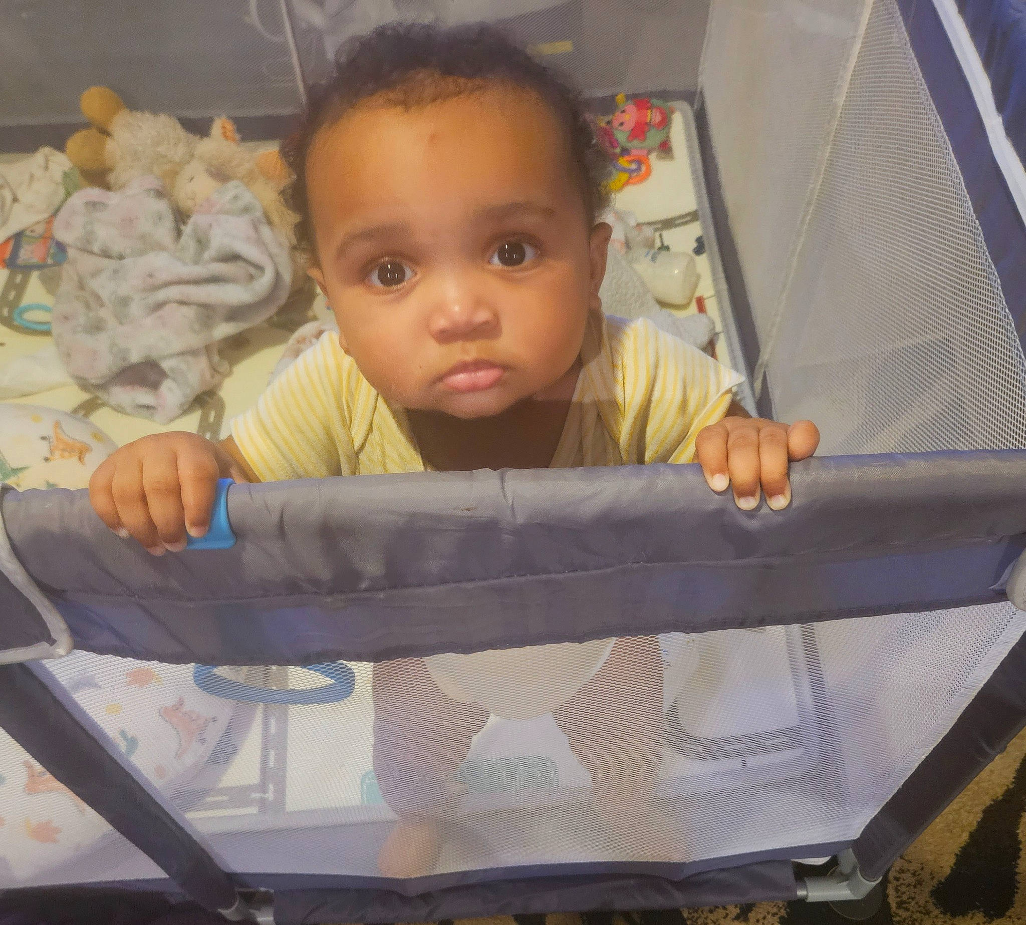 London joined the competition — help win amazing prizes! baby, baby_carriage, baby_products, baby_safety, baby_toddler_clothing, baby_toys, cheek, child, comfort, cradle, fun, infant_bed, iris, linens, person, room, sitting, skin, textile, thumb