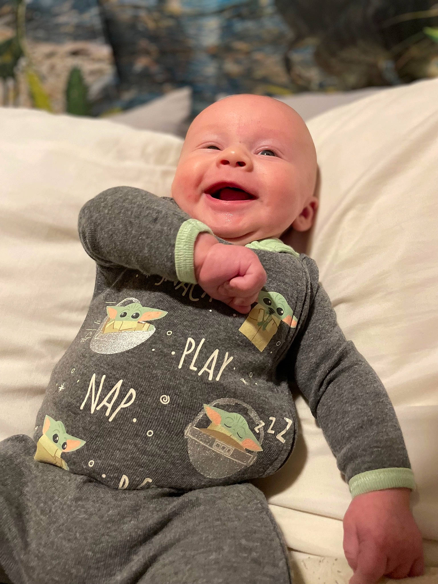 Bennett is registered to the contest to win money with this photo: baby, baby_toddler_clothing, child, comfort, fun, grass, happy, human_body, leisure, mammal, morning, people_in_nature, person, recreation, sand, sitting, sleeve, smile, t_shirt, toddler