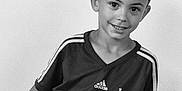 Mael a rejoint le concours — aidez-le/la à gagner de superbes lots ! adidas, athlete, ball, boy, casual_clothing, child, friendly, happy, indoor, monochrome, player, portrait, pose, short_hair, smiling, soccer_ball, sport, sports_jersey, team, young