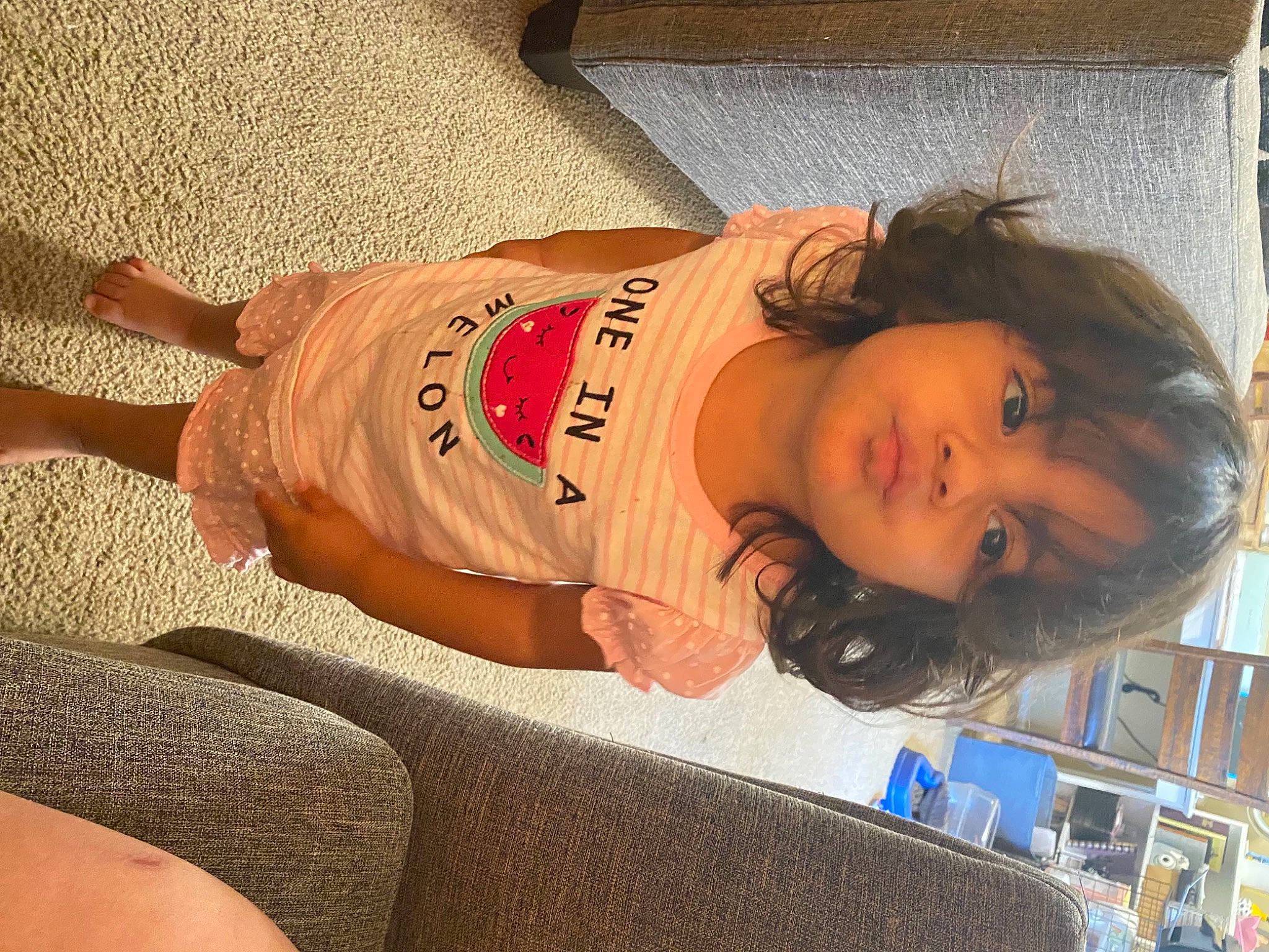 Alita is registered to the contest to win money with this photo: abdomen, chest, comfort, elbow, finger, flooring, fun, human_leg, joint, knee, leisure, long_hair, mouth, orange, person, sitting, thigh, toddler, trunk, waist