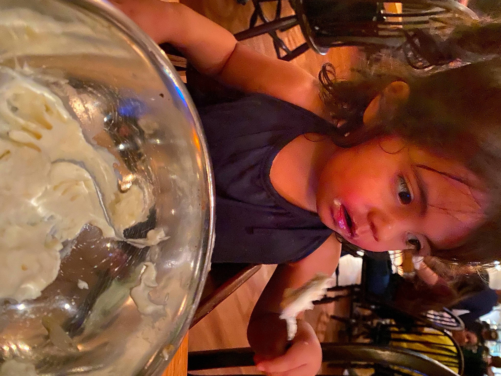 Alita is registered to the contest to win money with this photo: automotive_lighting, beauty, black_hair, child, circle, dreadlocks, drinkware, event, eyelash, eyewear, fun, glass, hair_coloring, leisure, person, plastic, science, stemware, transparent_material, tree