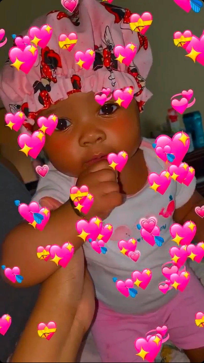 Sariyah is registered to the contest to win money with this photo: art, chest, child, finger, happy, headwear, heart, human_body, illustration, magenta, mouth, muscle, nail, organ, organism, party_supply, person, petal, pink, sweetness