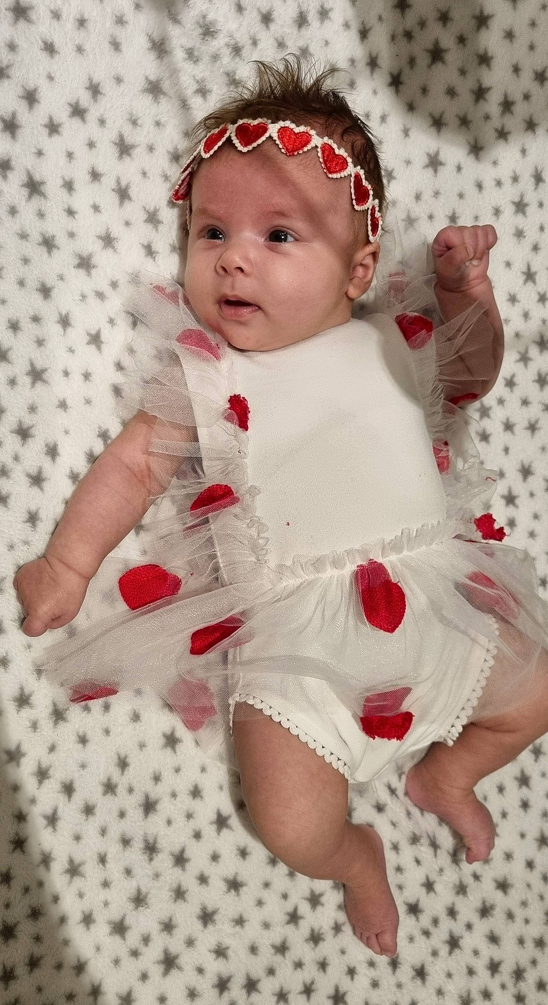 Mya participe au concours pour gagner de l'argent avec cette photo : baby, baby_toddler_clothing, cheek, child, dress, embellishment, eye, happy, hat, head, headband, headgear, headwear, lip, pattern, person, pink, sitting, skin, sleeve