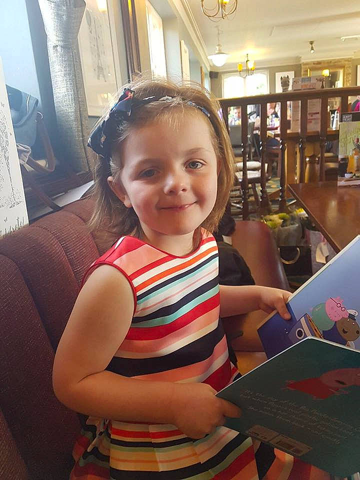 Bridget is registered to the contest to win money with this photo: child, cool, day, eye, fun, girl, hair, hairstyle, joy, person, product, sitting, skin, smile, snapshot, toddler