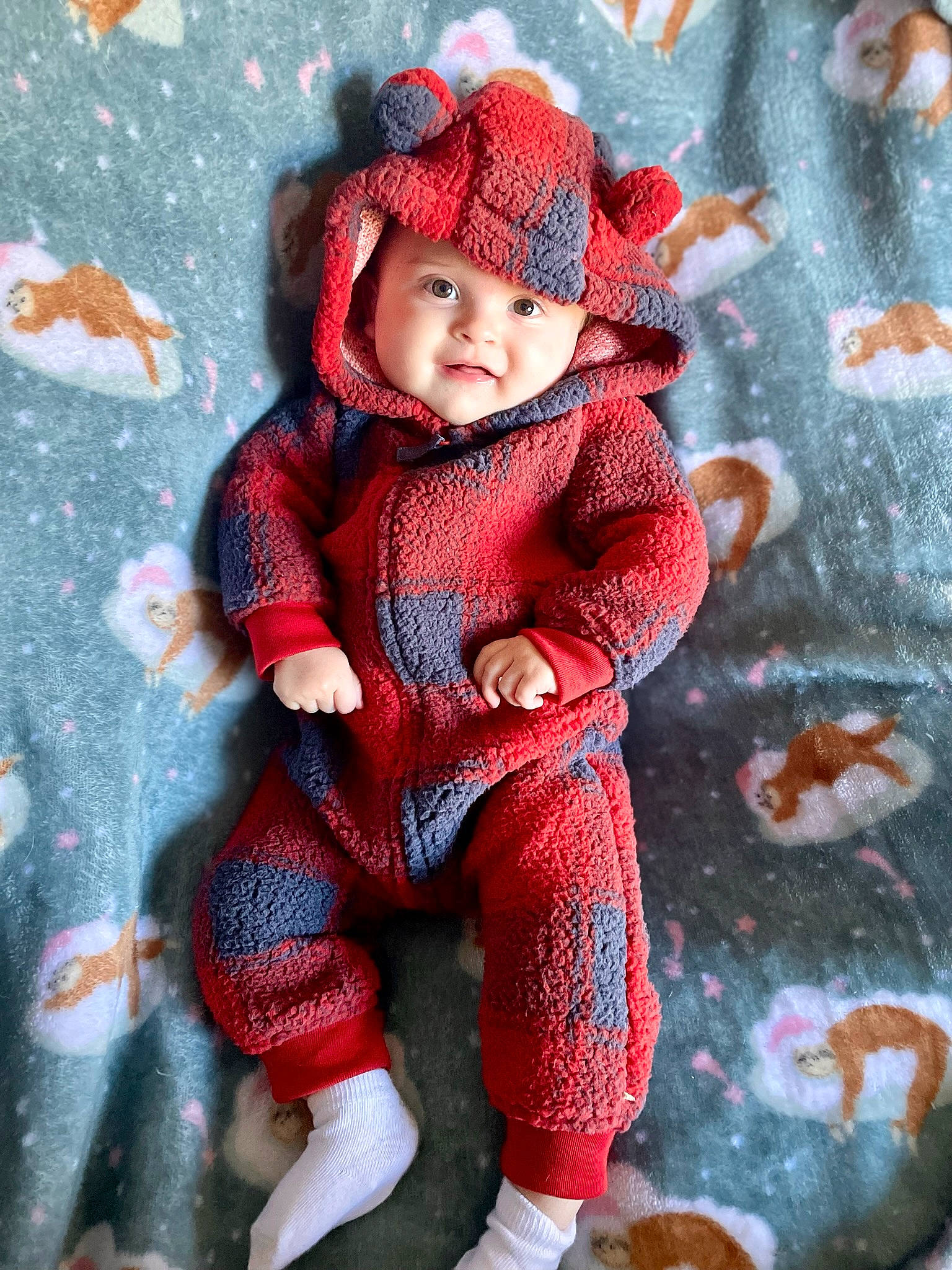 Everett is registered to the contest to win money with this photo: art, baby_toddler_clothing, cap, carmine, cheek, child, craft, creative_arts, doll, electric_blue, headwear, knit_cap, pattern, person, pink, red, sleeve, textile, toy, winter