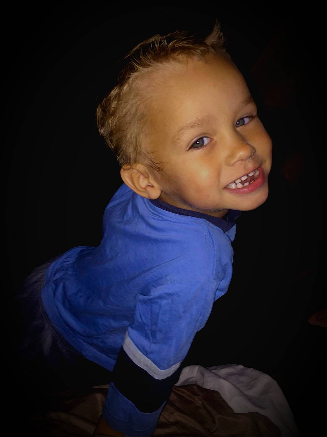 Jesse-james is registered to the contest to win money with this photo: arm, baby, blue, cheek, child, chin, eye, face, fun, head, human, iris, nose, person, photography, portrait, portrait_photography, skin, smile, standing