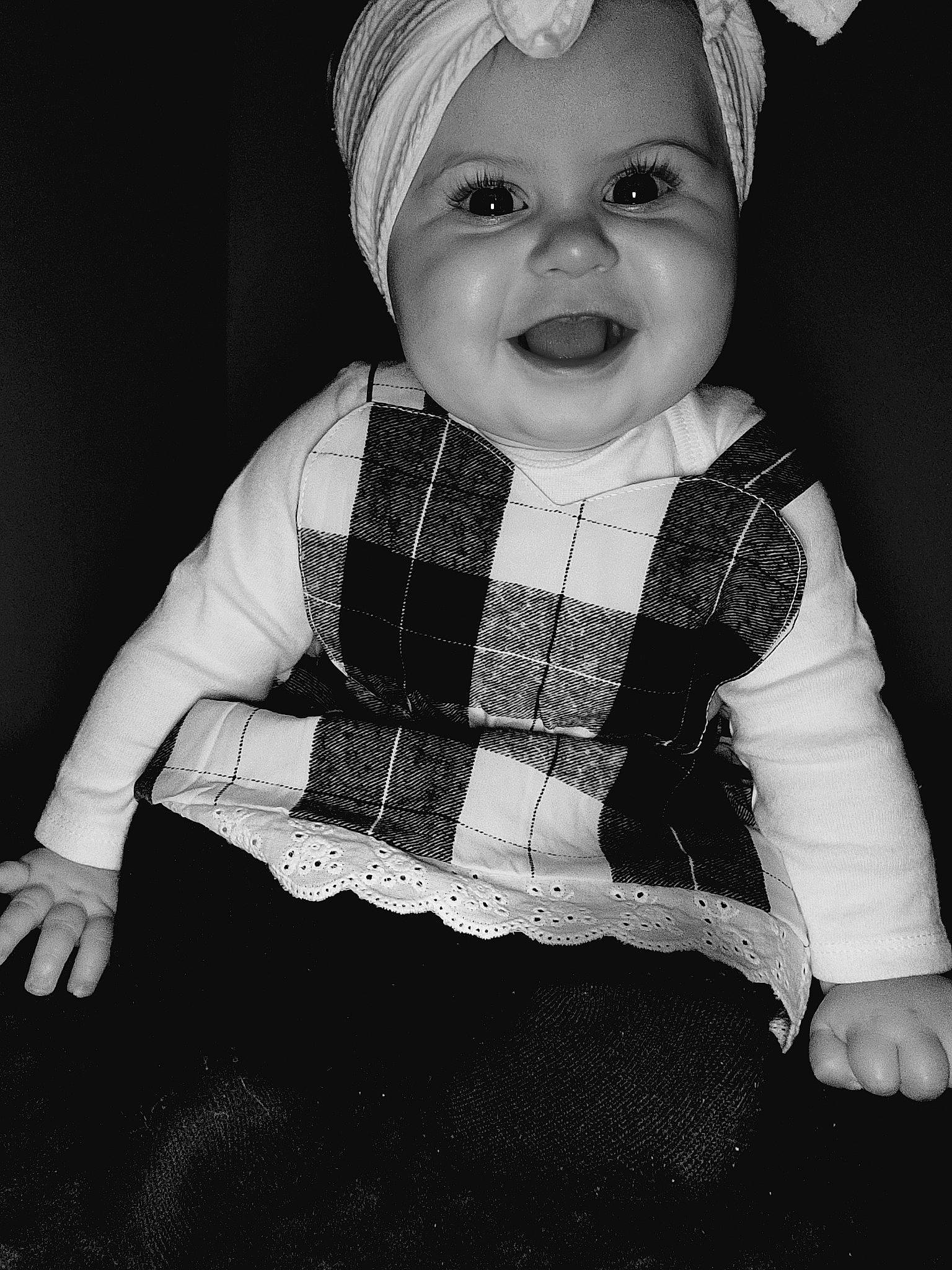 Rylee joined the competition — help win amazing prizes! baby, baby_products, baby_toddler_clothing, black, bow_tie, cap, child, costume_hat, fashion_accessory, flash_photography, happy, headgear, monochrome, monochrome_photography, pattern, person, sitting, sleeve, smile, toddler