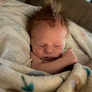 Riott joined the competition — help win amazing prizes! newborn, baby, sleeping, blanket, cozy, soft, hair, infant, cute, resting, child, wrapped, peaceful, portrait, skin, indoors, warm, toddler, person, face