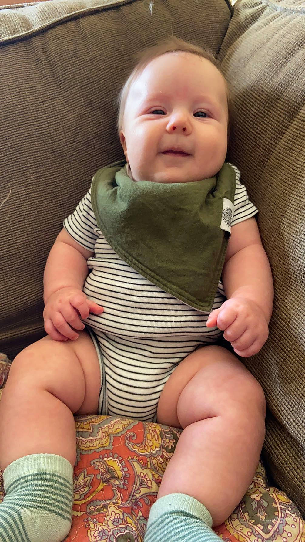 Luca joined the competition — help win amazing prizes! baby, baby_toddler_clothing, cheek, comfort, eye, face, facial_expression, finger, iris, joint, knee, lap, leg, neck, person, skin, sleeve, smile, stomach, thigh