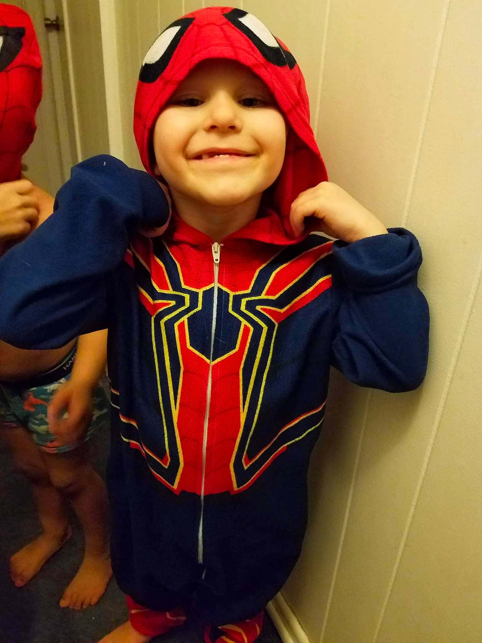 Derrick is registered to the contest to win money with this photo: cap, face, fictional_character, fun, glove, happy, head, headgear, headwear, jacket, jersey, joy, mouth, person, personal_protective_equipment, red, selfie, sleeve, smile, sportswear