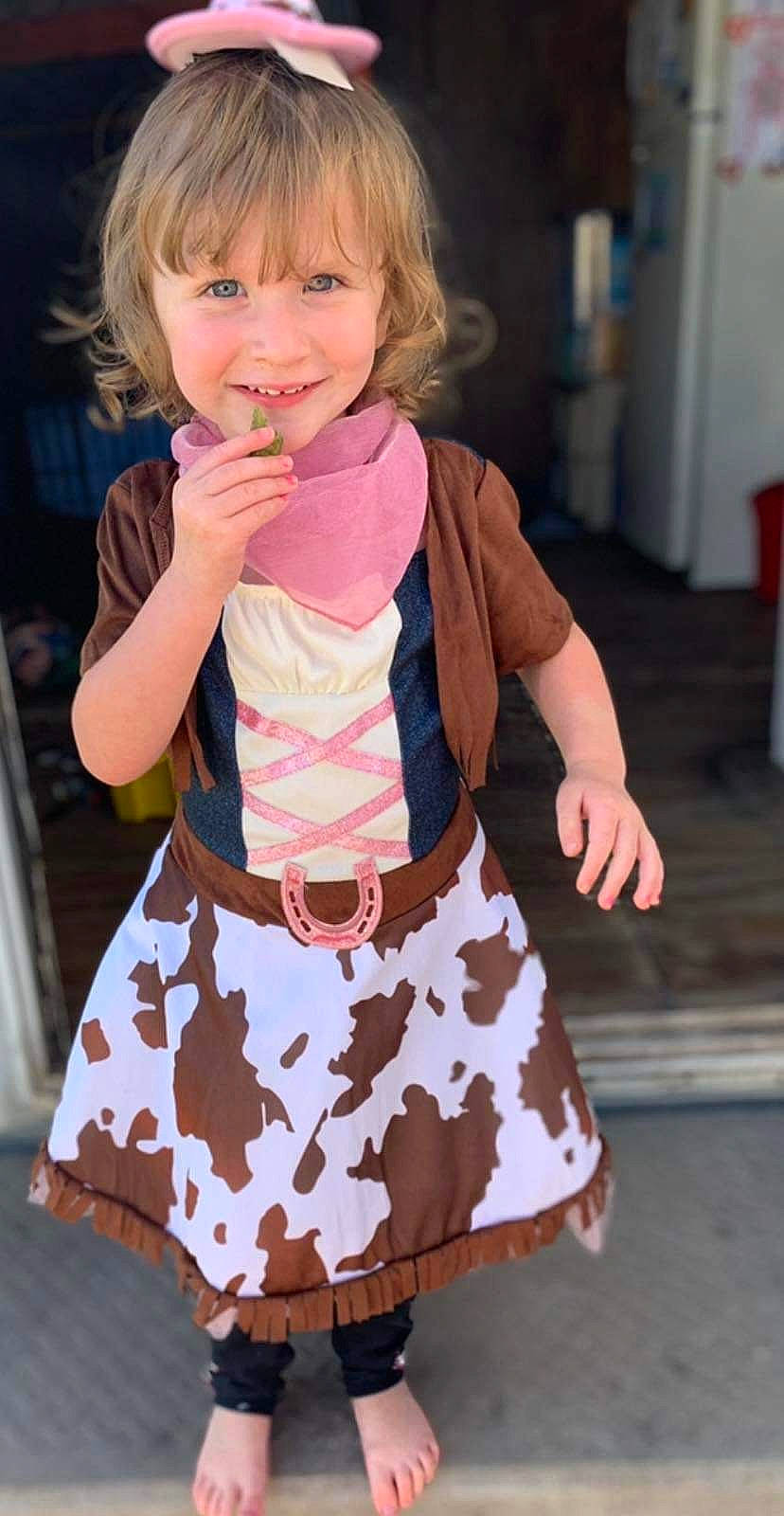Zaylee joined the competition — help win amazing prizes! baby_toddler_clothing, child, clothing, day_dress, fashion_accessory, fashion_design, hairstyle, happy, joy, magenta, neck, pattern, peach, person, pink, ruffle, sleeve, smile, thumb, toddler