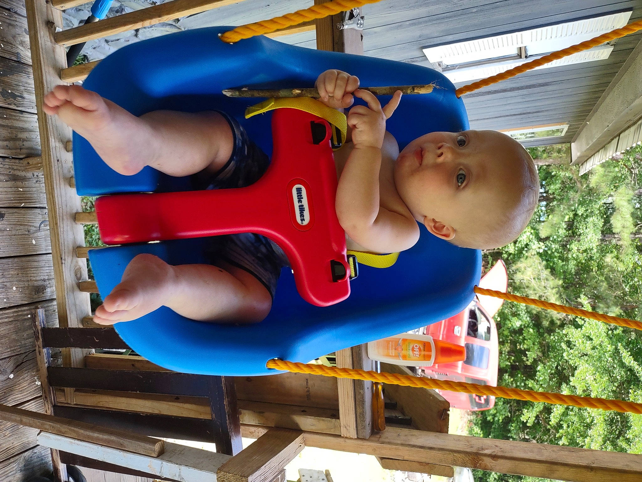 Brayden is registered to the contest to win money with this photo: blue, cap, chest, child, electric_blue, fun, hat, human_leg, knee, leisure, person, personal_protective_equipment, recreation, shorts, smile, sportswear, t_shirt, thigh, toddler, vacation