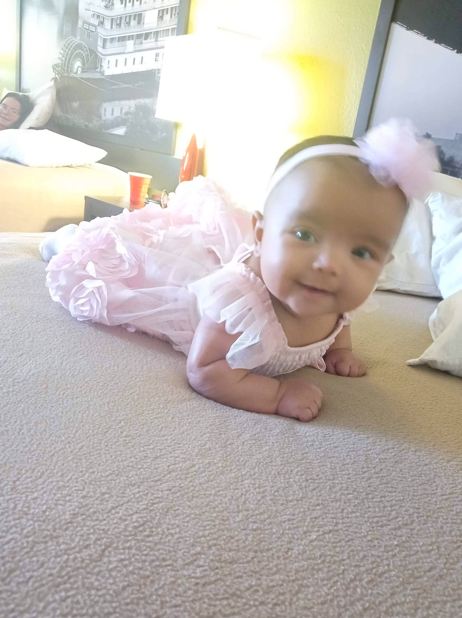 Lillyaunna joined the competition — help win amazing prizes! baby, baby_toddler_clothing, cheek, child, comfort, crawling, floor, flooring, foot, fun, happy, hardwood, human_leg, linens, person, room, sitting, skin, smile, toddler