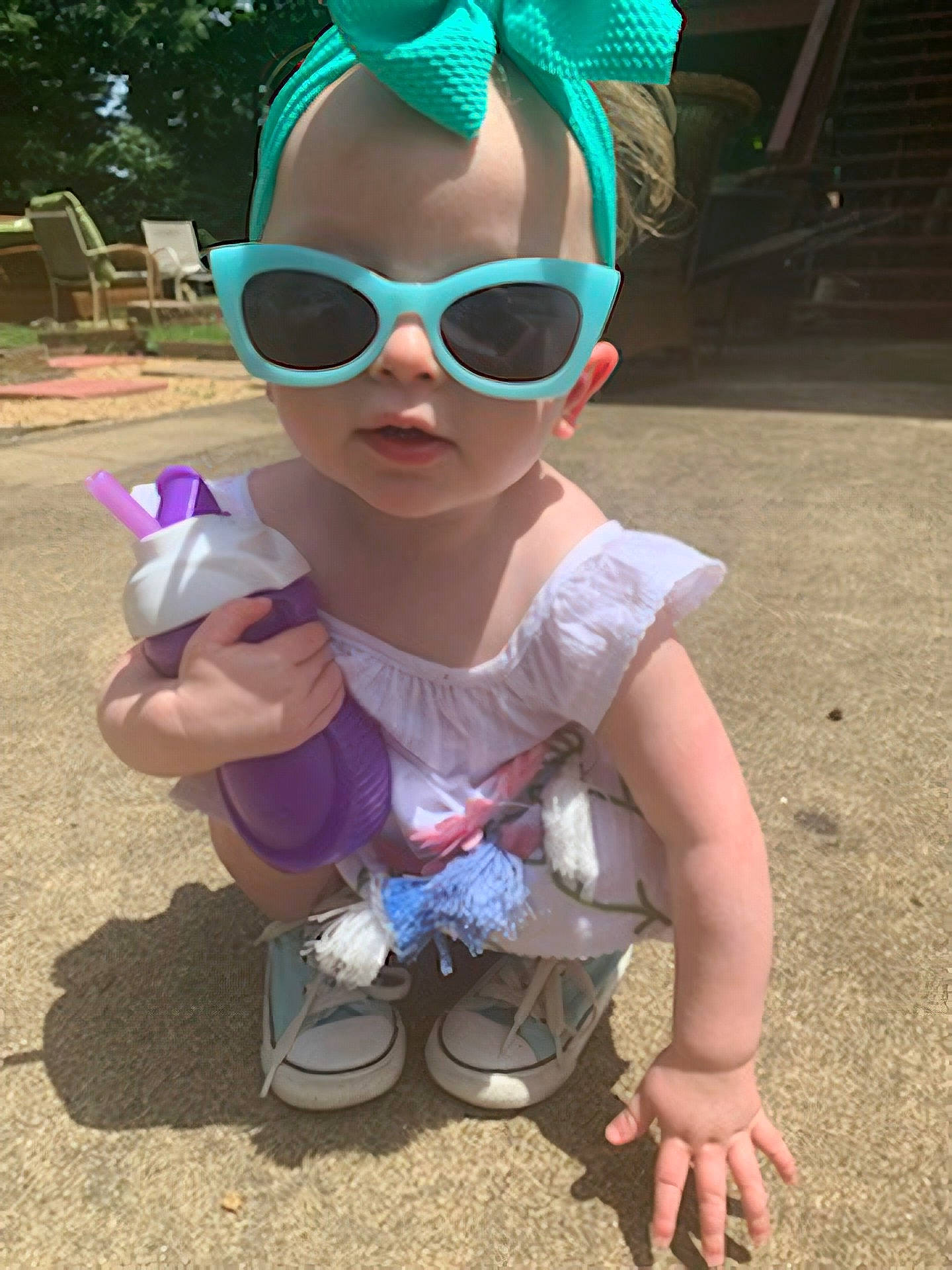 Ember is registered to the contest to win money with this photo: baby, child, cool, eyewear, fashion_accessory, fun, glasses, goggles, head, headgear, person, personal_protective_equipment, plant, play, purple, smile, summer, sunglasses, toddler, vacation