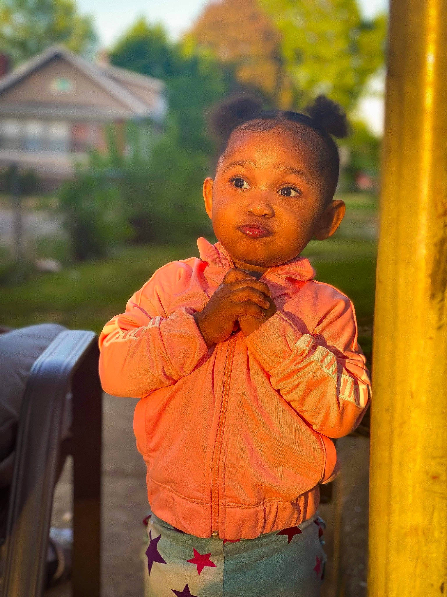 Avayah joined the competition — help win amazing prizes! child, chin, eye, fun, grass, hairstyle, happy, hoodie, leisure, orange, people_in_nature, person, portrait_photography, sitting, sleeve, t_shirt, toddler, tree, vacation