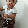 Icslyn joined the competition — help win amazing prizes! toddler, child, pacifier, white_shirt, leopard_print_pants, standing, curly_hair, carpet, wall, white_shoes, indoor, baby, person, cute, expression, curiosity, small_hands, floor, home, young