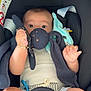 Louis a rejoint le concours — aidez-le/la à gagner de superbes lots ! baby, bracelet, bunny, car_seat, child, clothing, cute, expression, face, hand, holding, indoors, infant, legs, pacifier, plush_toy, seatbelt, sitting, striped_shorts, wide_eyes