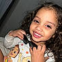 Loreanny Kataleya joined the competition — help win amazing prizes! cartoon_shirt, child, closeup, clothing, curly_hair, cute, face, fashion, fun, hand, happy, indoor, light_skin, long_sleeve, person, playful, portrait, smile, sunglasses, young