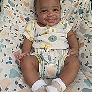 Princeton joined the competition — help win amazing prizes! baby, smiling, child, infant, sitting, baby_seat, clothing, patterned, cute, happy, face, person, indoors, sock, fabric, comfort, portrait, young_child, seat, expression
