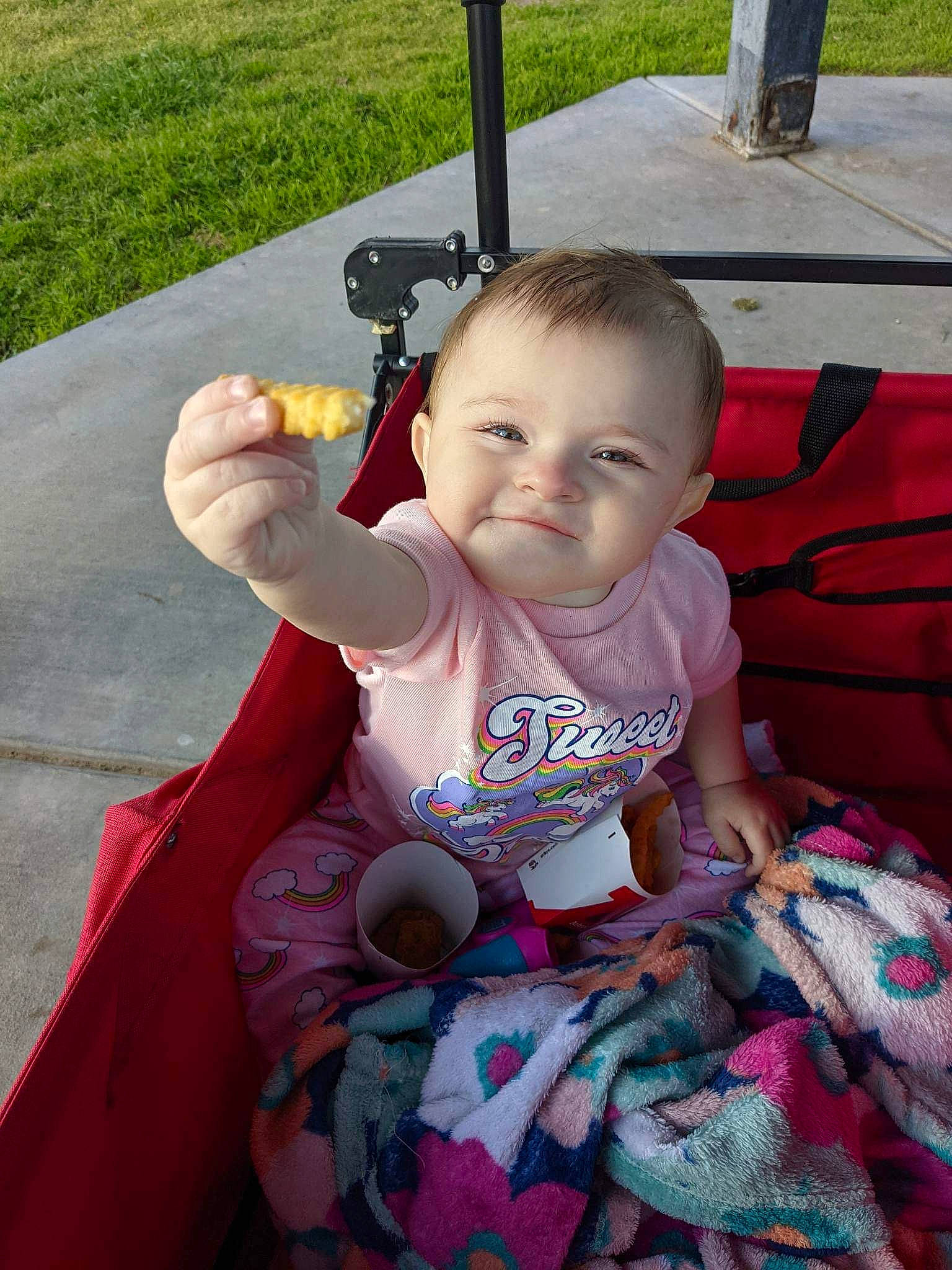Desiree joined the competition — help win amazing prizes! baby, baby_carriage, baby_products, baby_toddler_clothing, child, eye, facial_expression, fun, grass, happy, lap, leisure, magenta, person, pink, play, recreation, sitting, skin, toddler