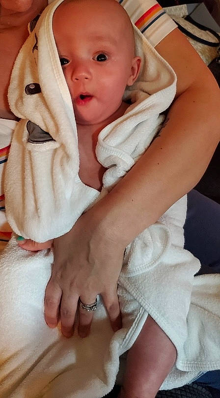 Cade joined the competition — help win amazing prizes! baby, baby_toddler_clothing, cheek, child, comfort, elbow, event, fashion_accessory, finger, gesture, happy, linens, lip, nail, person, pink, skin, sleeve, thumb, toddler