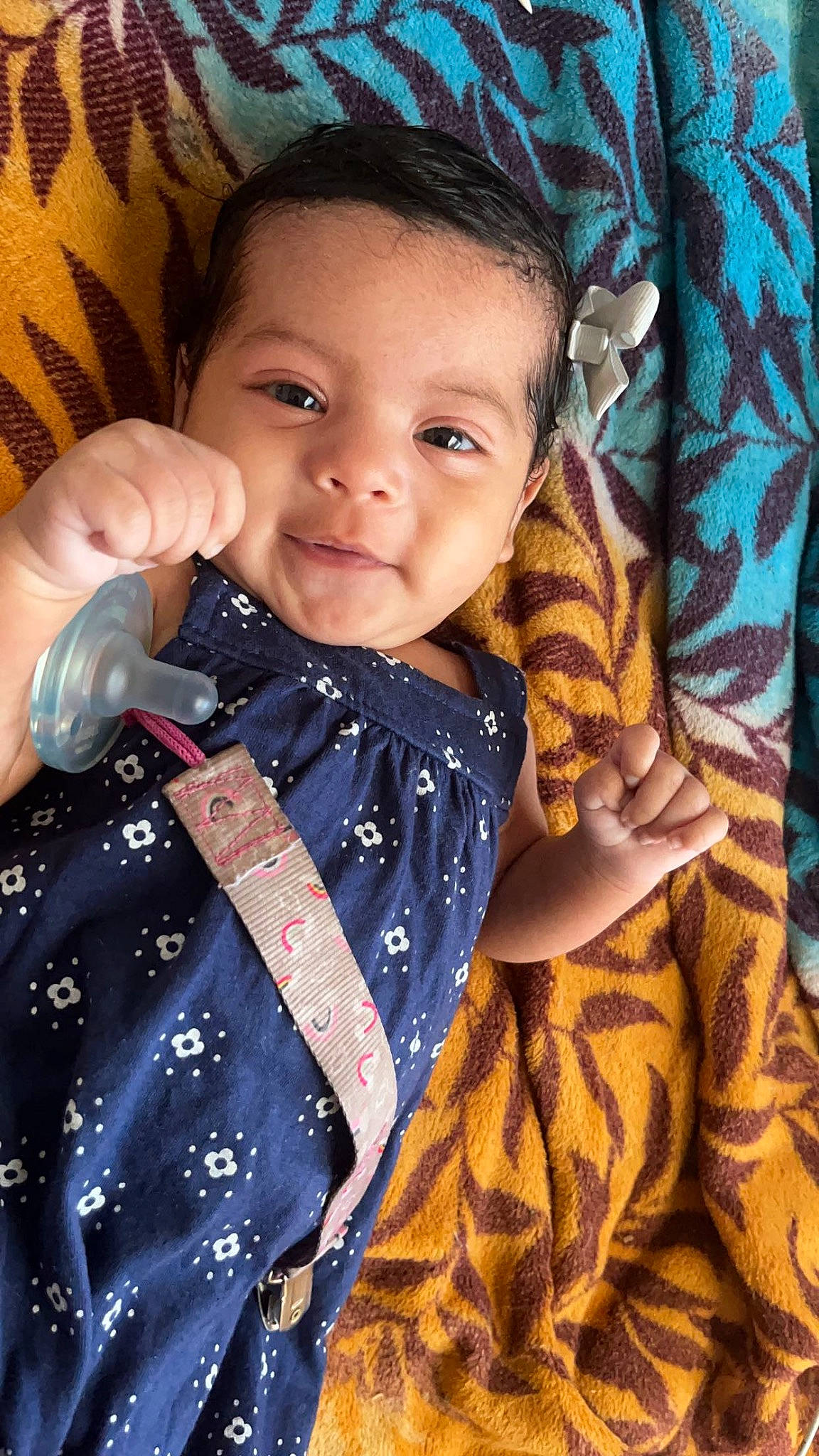 Elena is registered to the contest to win money with this photo: baby_toddler_clothing, cheek, chin, eye, eyebrow, eyelash, face, forehead, gesture, hand, head, human_body, iris, lip, neck, nose, person, skin, sleeve, smile