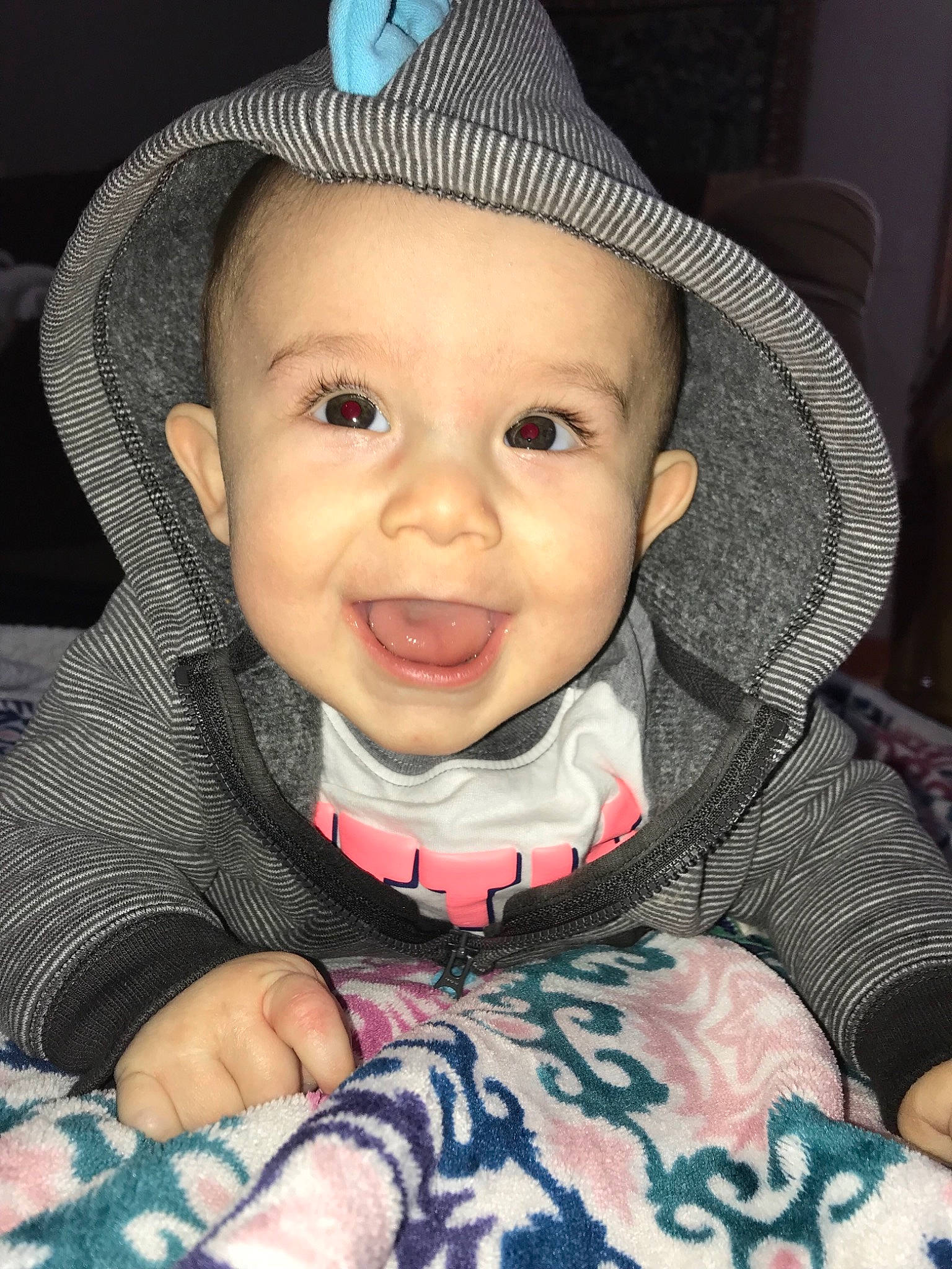 Kevin is registered to the contest to win money with this photo: baby, cheek, child, chin, cool, eye, face, facial_expression, fun, hat, head, headgear, iris, lip, nose, person, sitting, skin, smile, sun_hat