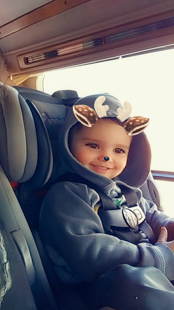 Sebastian joined the competition — help win amazing prizes! baby, car, car_seat, child, city_car, ear, family_car, joy, person, smile, toddler, vacation, vehicle