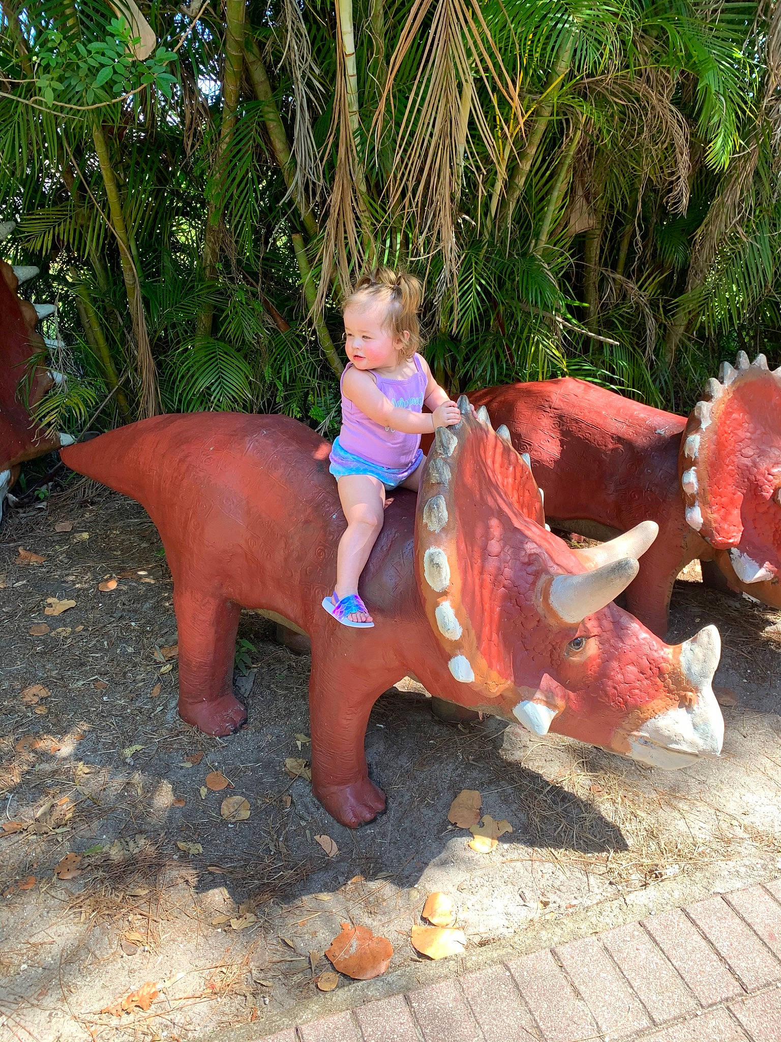 Estelle joined the competition — help win amazing prizes! dinosaur, fawn, lawn_ornament, person