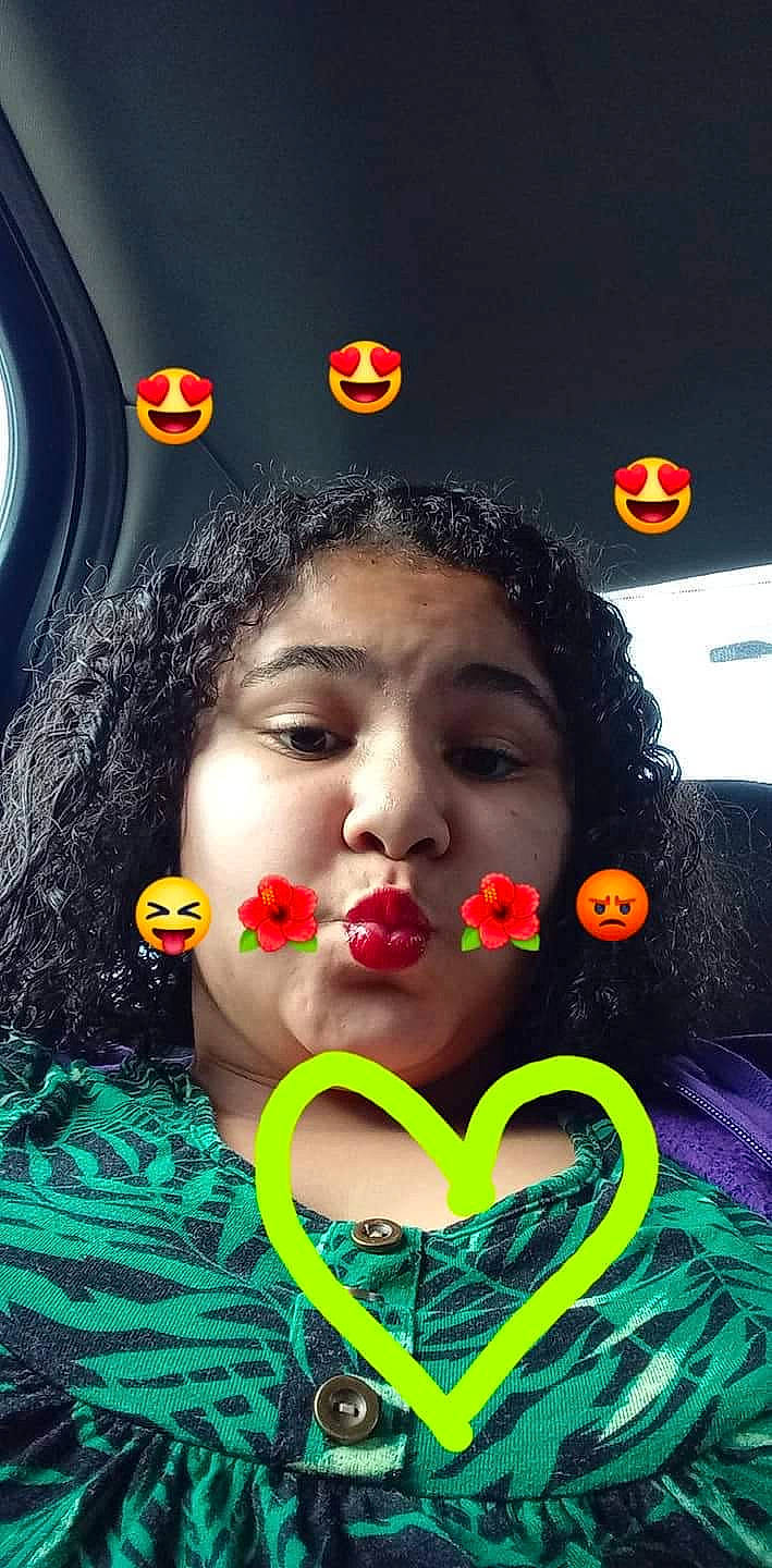 Ashlynn is registered to the contest to win money with this photo: beauty, black_hair, close_up, earrings, eye_shadow, eyebrow, eyelash, eyewear, facial_expression, fashion_accessory, fun, hairstyle, happy, lip, lipstick, mouth, nose, organ, person, petal