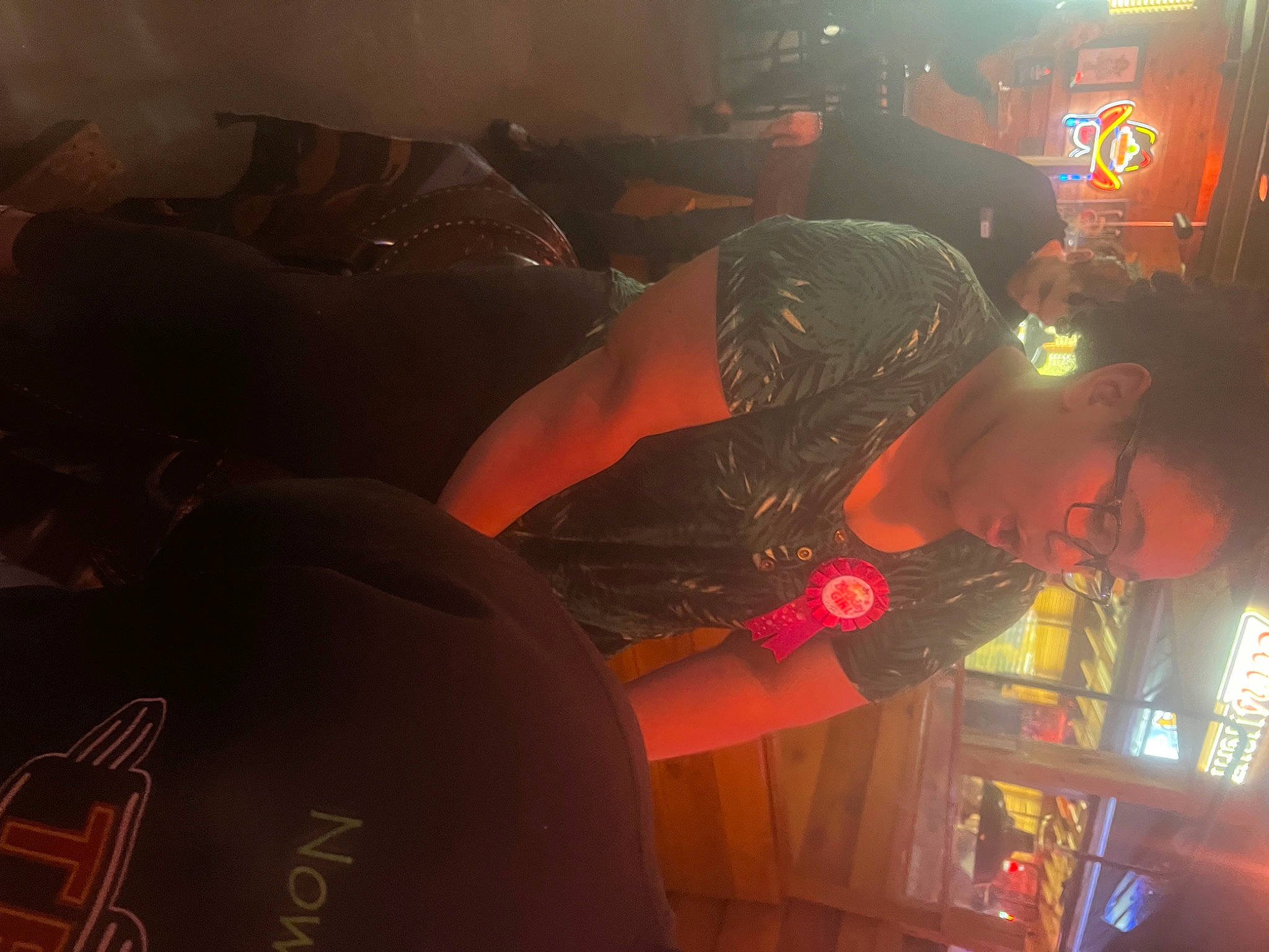 Ashlynn joined the competition — help win amazing prizes! auto_part, automotive_exterior, automotive_lighting, automotive_tire, darkness, entertainment, event, fun, hat, lens_flare, luxury_vehicle, music, music_venue, night, person, personal_protective_equipment, room, t_shirt, visual_effect_lighting