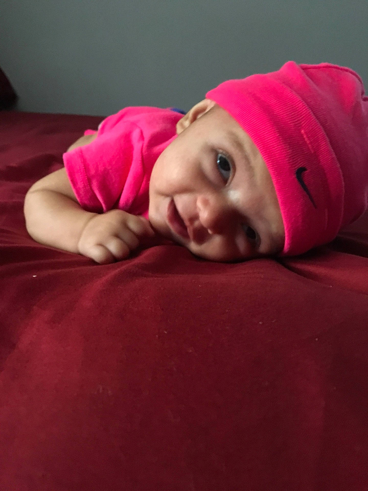 Brianna is registered to the contest to win money with this photo: beanie, cap, cheek, child, eye, girl, hair_accessory, hat, headgear, lip, magenta, neck, person, pink, purple, red, skin, smile, textile, toddler