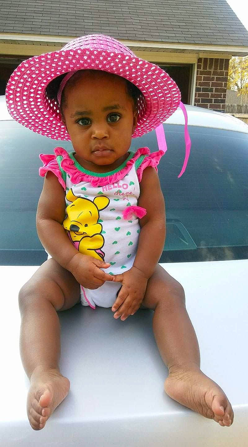 Shardonaye joined the competition — help win amazing prizes! baby, baby_products, baby_toddler_clothing, child, fashion_accessory, hat, headgear, leg, magenta, person, pink, product, sitting, skin, sun_hat, thigh, toddler, vacation