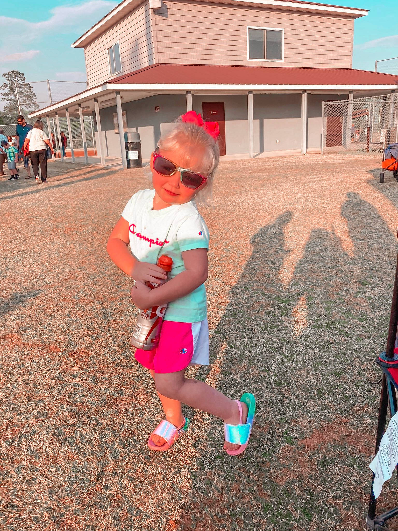 Riley joined the competition — help win amazing prizes! asphalt, baseball_cap, community, cool, eyewear, fun, glasses, happy, hat, leaf, leisure, mouth, person, pink, public_space, shorts, sky, summer, sunglasses, travel