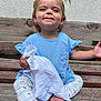toddler, child, bench, blue_shirt, blanket, leggings, pigtails, smile, earrings, outdoor, wood, wall, happy, sitting, barefoot, person, cute, texture, young_child, portrait