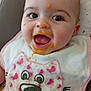 Athéna participe au concours pour gagner de l'argent avec cette photo : baby, bib, food, messy_face, happy, smiling, child, infant, clothing, cute, face, pink, orange_food, feeding, highchair, tongue_out, indoor, closeup, expression, baby_food