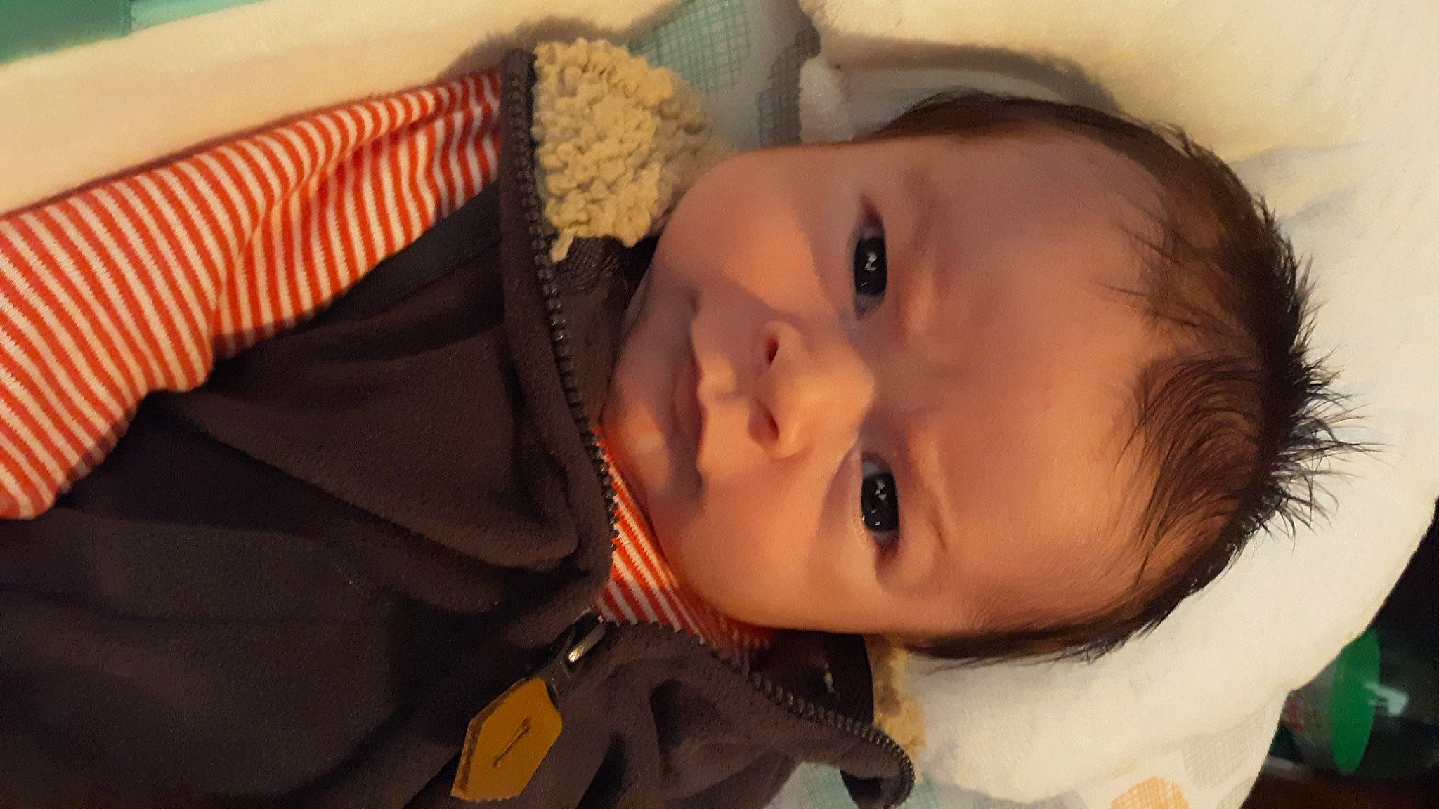 Quinton is registered to the contest to win money with this photo: baby, baby_products, cheek, child, ear, eye, face, facial_expression, forehead, head, headgear, iris, lip, mouth, nose, person, portrait_photography, product, skin, smile