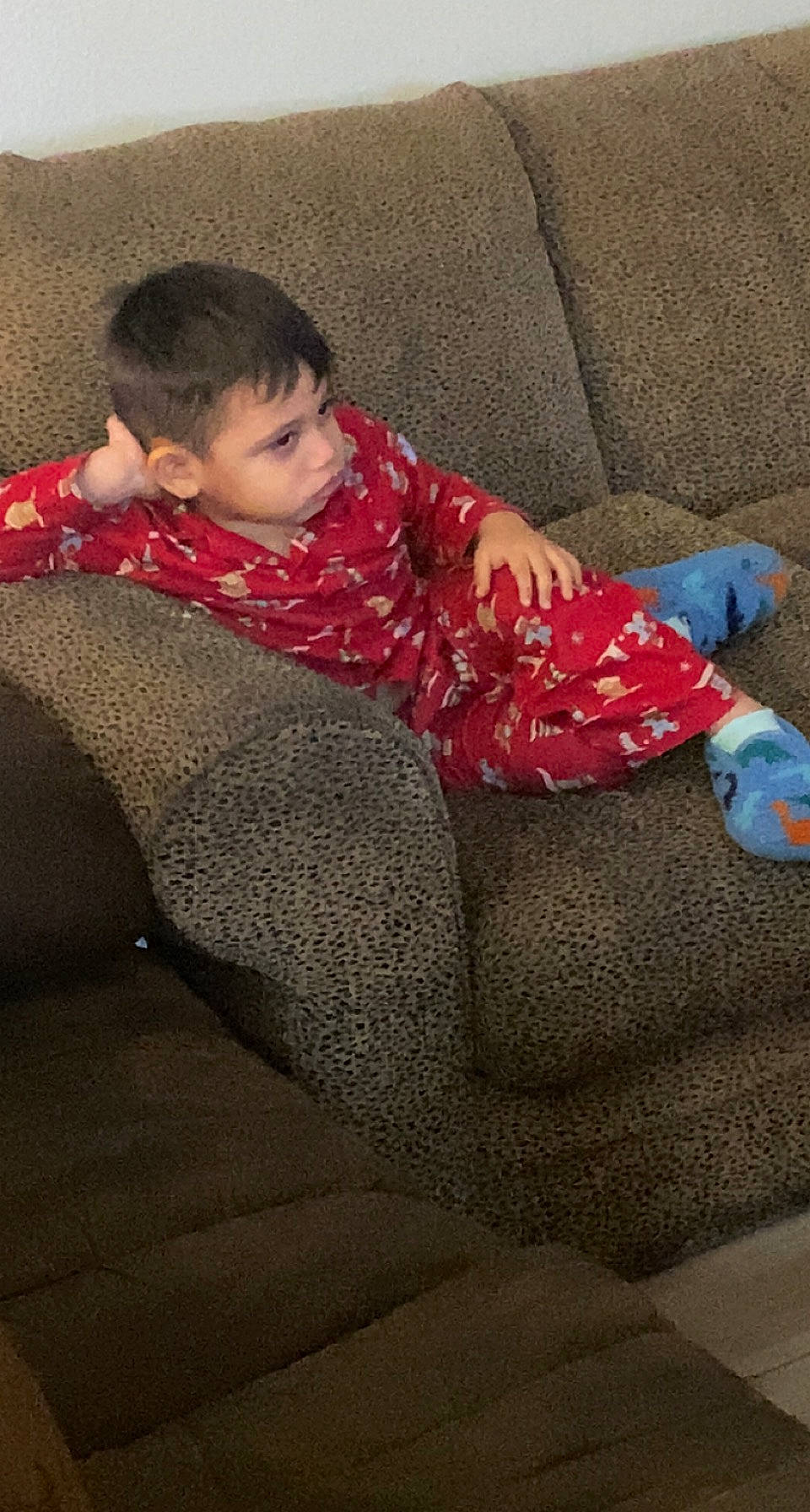 Eddie joined the competition — help win amazing prizes! baby, baby_toddler_clothing, carmine, child, comfort, couch, floor, flooring, head, human_leg, knee, lap, linens, living_room, pattern, person, sitting, sleeve, sock, thigh