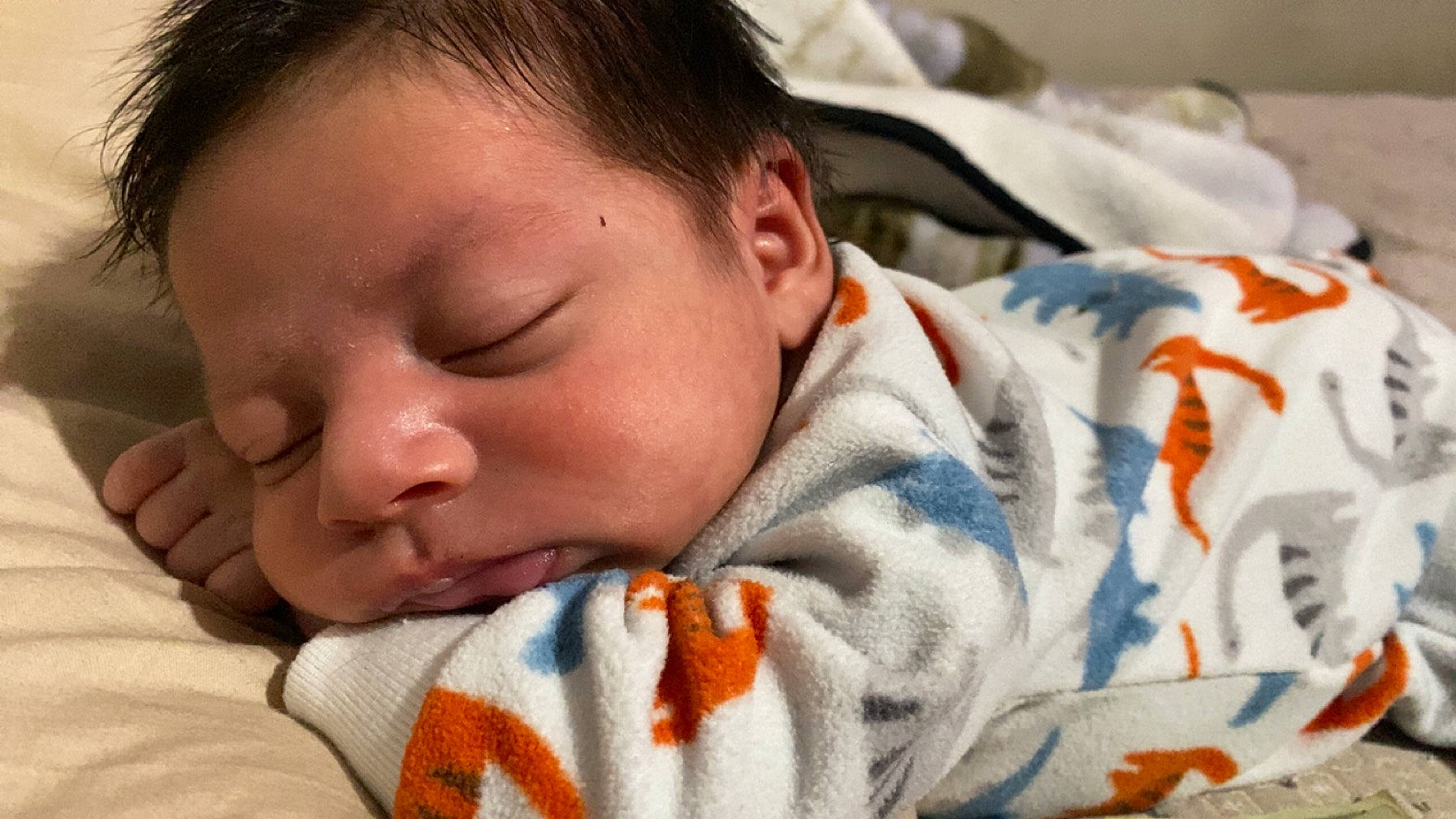 Sebastian is registered to the contest to win money with this photo: baby, baby_sleeping, bedding, bedtime, cheek, child, close_up, comfort, eyelash, face, facial_expression, head, linens, mouth, nap, nose, person, room, skin, textile