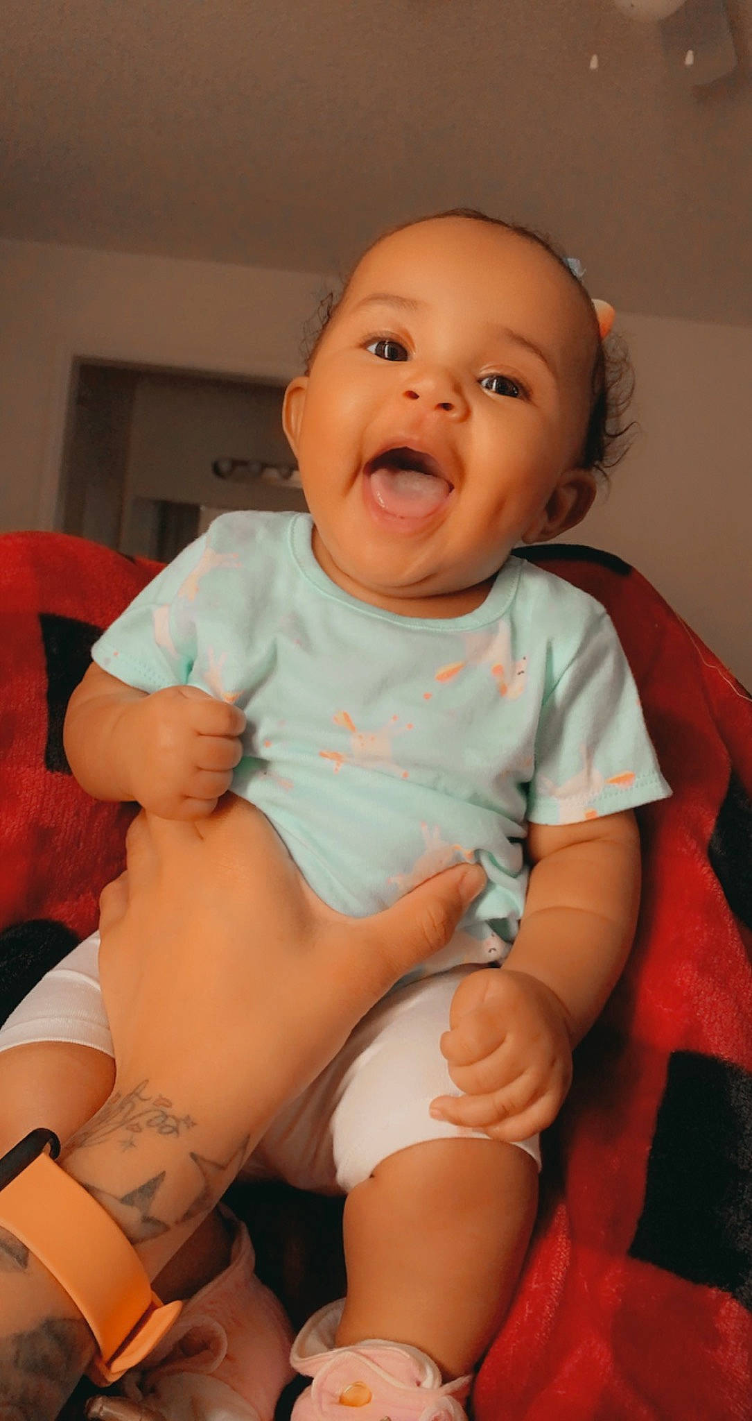 Kamiah joined the competition — help win amazing prizes! baby_toddler_clothing, cheek, comfort, eye, facial_expression, finger, happy, iris, knee, lip, mouth, neck, nose, person, pink, product, skin, sleeve, smile, stomach