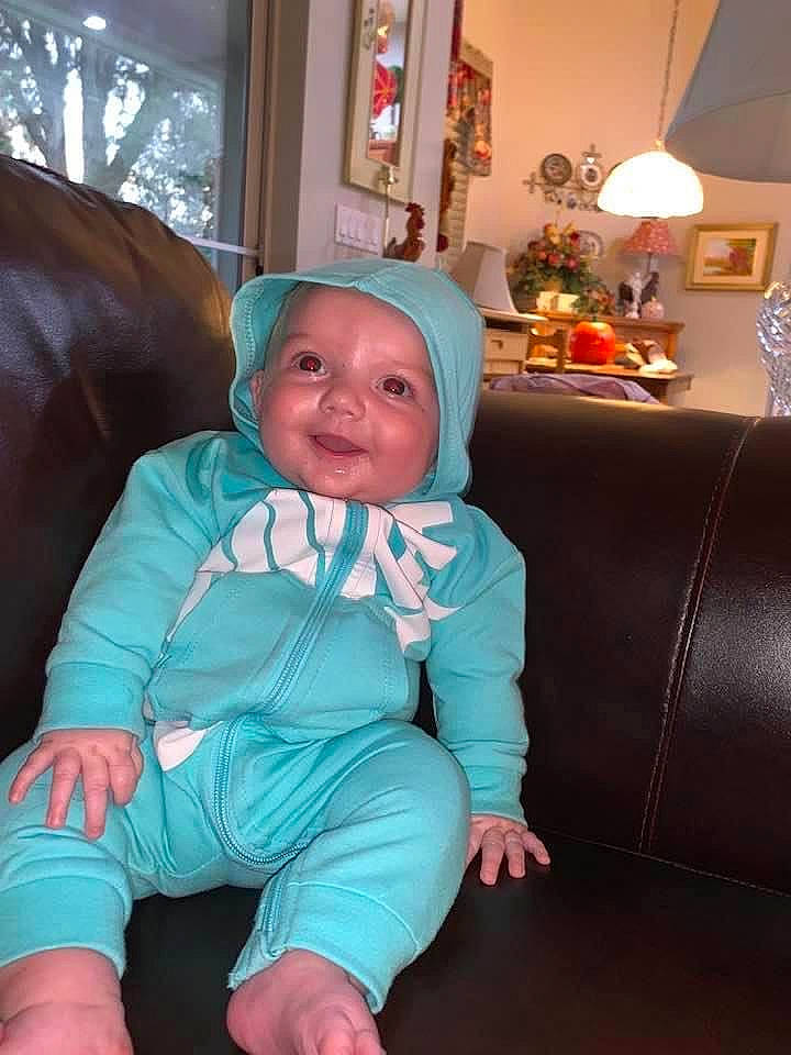 Isabella Grace joined the competition — help win amazing prizes! baby_toddler_clothing, child, comfort, couch, eye, headwear, home, home_accessories, interior_design, lamp, lampshade, light_fixture, lighting, lighting_accessory, living_room, nose, person, picture_frame, room, sitting