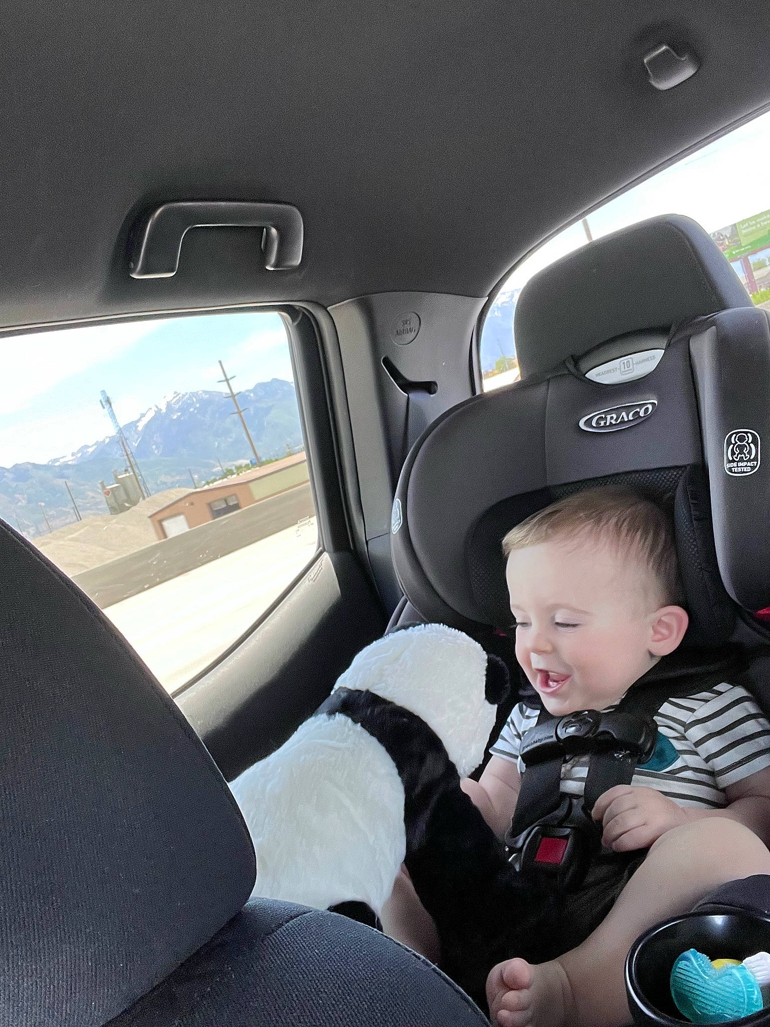 Lucas joined the competition — help win amazing prizes! auto_part, automotive_design, automotive_exterior, car, car_seat, car_seat_cover, comfort, family_car, head_restraint, motor_vehicle, person, personal_luxury_car, seat_belt, smile, steering_part, steering_wheel, toddler, vehicle, vehicle_door, white