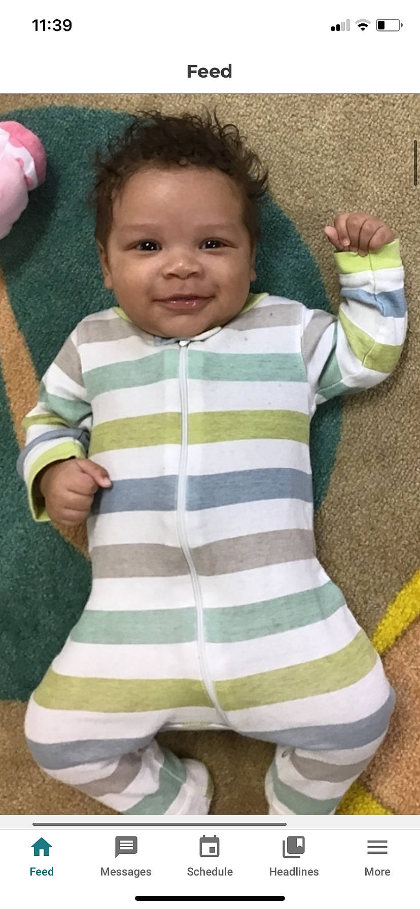 Amari joined the competition — help win amazing prizes! arm, baby, baby_toddler_clothing, cheek, chin, face, finger, gesture, hand, head, human_body, joint, joy, neck, nose, person, skin, sleeve, smile, t_shirt