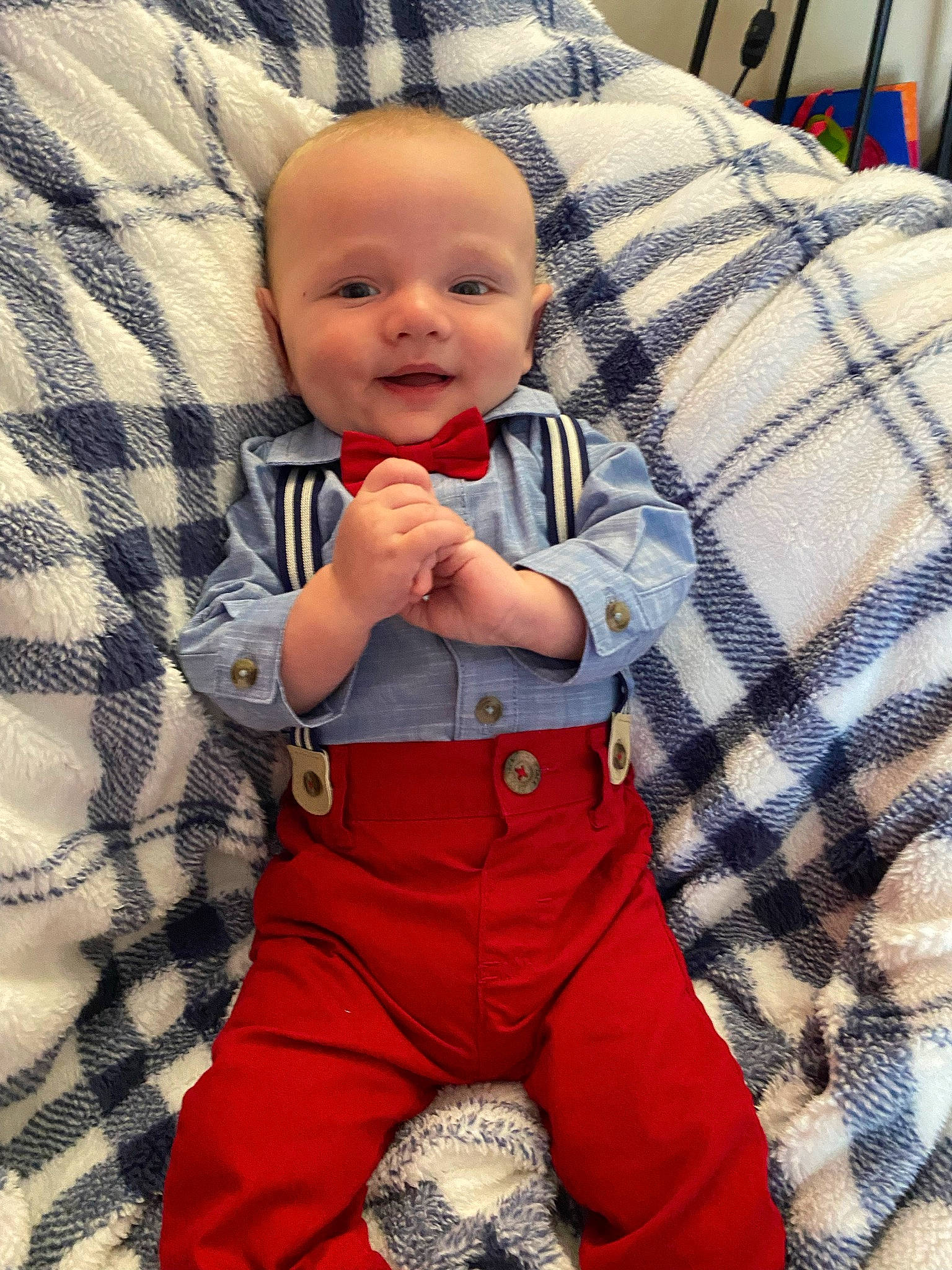 Kayden is registered to the contest to win money with this photo: baby, baby_toddler_clothing, cheek, child, comfort, cool, eye, happy, head, human, pattern, person, plaid, product, skin, sleeve, smile, t_shirt, tartan, textile