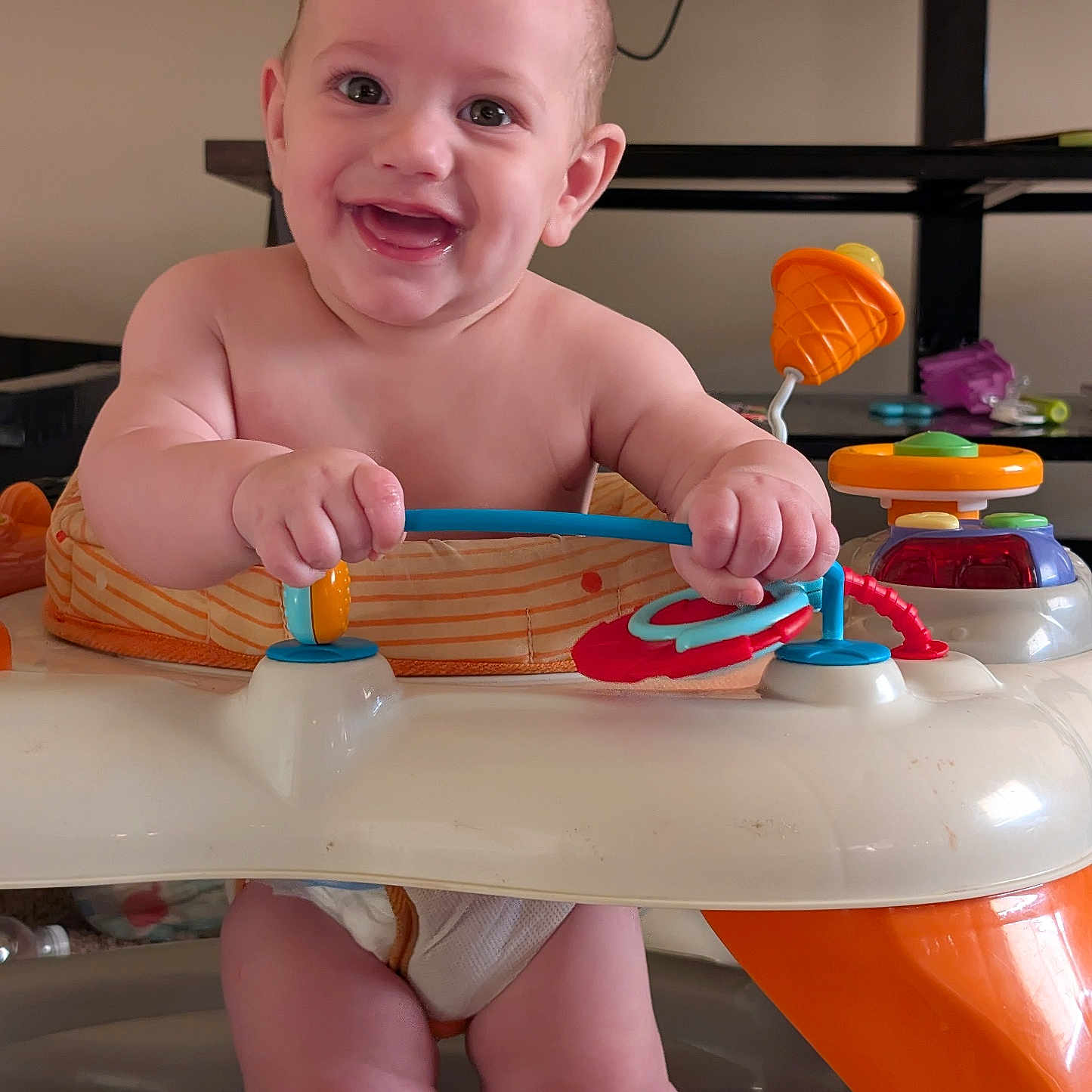 Matthew joined the competition — help win amazing prizes! baby, carpet, cheerful, child, colorful, cute, diaper, face, hands, happy, indoor, infant, legs, person, plastic, play, smile, toy, walker, young