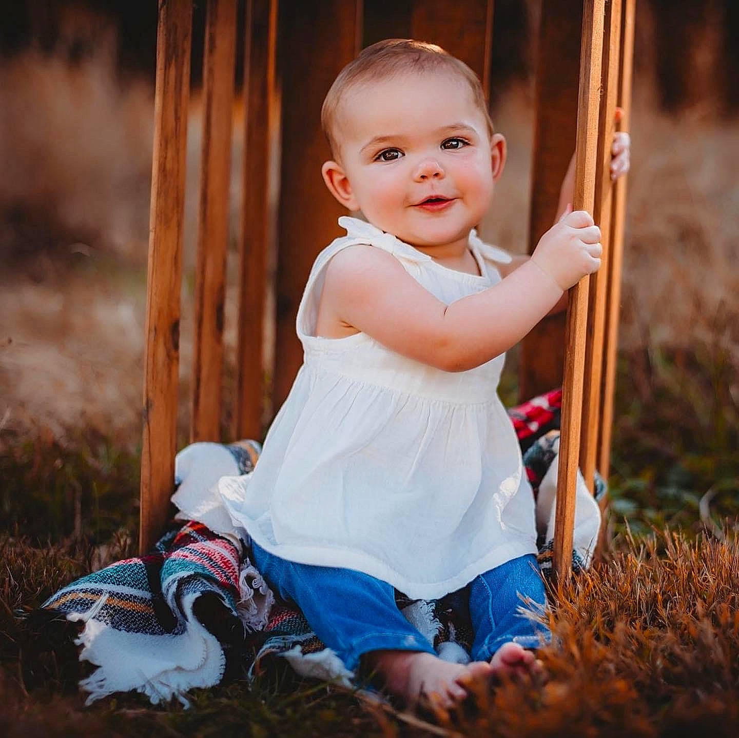 Darla is registered to the contest to win money with this photo: baby, child, child_model, dress, happy, joy, person, photography, portrait_photography, sitting, smile, swing, toddler, tree