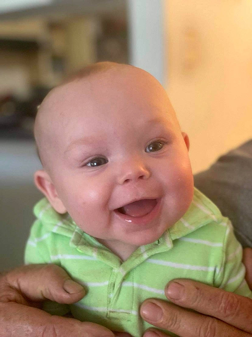 Daxtin joined the competition — help win amazing prizes! baby, baby_toddler_clothing, cheek, ear, eye, eyebrow, finger, gesture, hand, happy, head, iris, lip, nail, nose, person, sleeve, smile, thumb, toddler