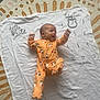 Tommy joined the competition — help win amazing prizes! baby, infant, smiling, orange_onesie, milestone_blanket, hello_world, months, lying_down, happy, arms_up, carpet, floor, cute, child, portrait, indoors, pajamas, celebration, baby_clothes, two_months