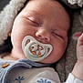 Aston joined the competition — help win amazing prizes! baby, sleeping, pacifier, blanket, clothing, blue, white, face, infant, cute, soft, button, hand, toddler, closeup, peaceful, resting, child, portrait, comfort